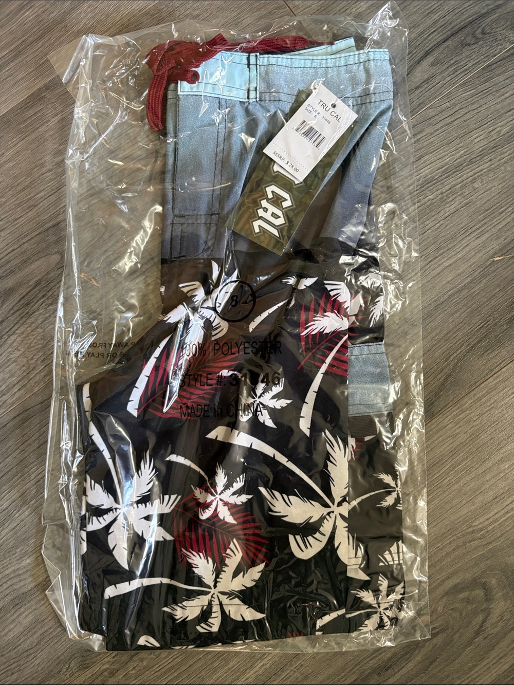 Kids Black Palm-Print Swim Trunks with Red Drawstring